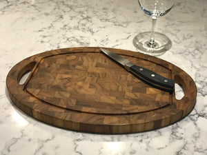 Coupe Oval Teak Cutting Board with Juice Groove and Handles Board